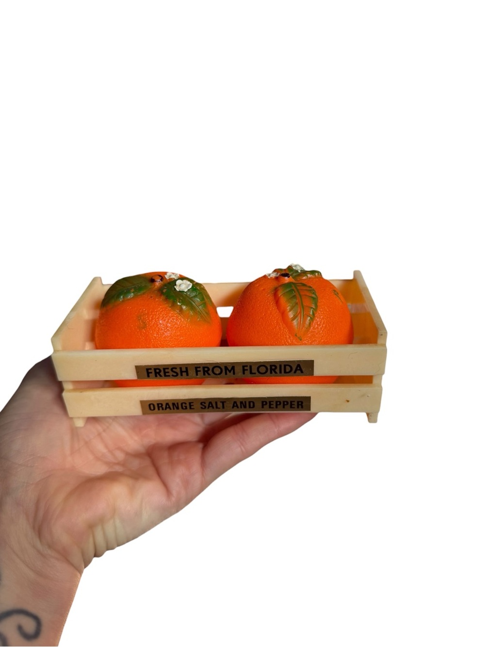 Plastic vintage orange Salt and Pepper Shakers crate